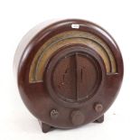 An EKCO model AD65 wood-effect Bakelite radio, 1934, designed by Wells Coates for E K Cole Ltd,