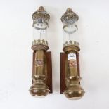 A pair of brass and copper GWR design wall lamps, 35.5cm, with oak mounting plaques