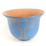 A signed pottery jardiniere with incised and painted decoration, height 24cm