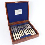 A 19th century set of ivory-handled silver plated dessert knives and forks for 12 people, in