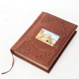 A Vintage Russian leather notepad, with inset miniature porcelain panel