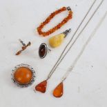 Various Baltic amber and silver jewellery, including pendants, bracelet, brooch and ring