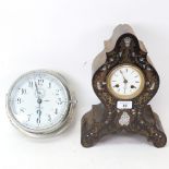 A Vintage ship's bulkhead clock, marked NV Observator Rotterdam, and a brass and mother-of-pearl
