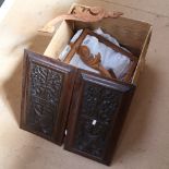 A pair of carved mahogany wall panels, stained oak foliate wall bracket, miniature picture frames