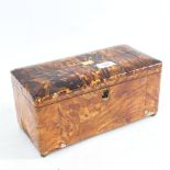 A 19th century tortoiseshell-clad tea caddy, length 29cm, and an ebony rule