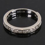 A modern 14ct white gold Cubic Zirconia three-quarter eternity ring, size M, 2.4g