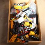 A box of various toy trucks and lorries