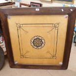 A Karum's Carrom table-top games board, with playing pieces and leaflet