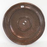 Antique copper charger, 59cm across