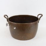 An Antique 2-handled copper pot, 59.5cm diameter