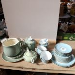 A Poole Pottery tea service, and Royal Worcester Woodland pattern tea service