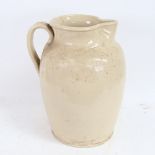 A large Doulton Lambeth 2 1/2 gallon measure flagon, height 39cm