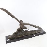 H C Ruchot, a large French Art Deco bronze sculpture, sea bird on the crest of a wave, on black