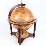 A reproduction table-top globe drinks cabinet, height 55cm, diameter 41cm