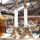 A pair of Renaissance style gilt-bronze and rock crystal lamp bases, cherub and dolphin mounts, with