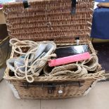 A large wicker hamper, containing shopping baskets, cocktail set, cutlery etc