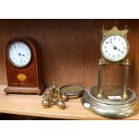 A mahogany inlaid mantel clock, with arch-top, 21cm, and a brass 400-day clock