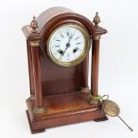 A 19th century mahogany 8-day pillar clock, white enamel dial with Roman numeral hour markers, and