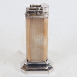 A Dunhill silver plated tallboy table lighter, serial no. 18787, height 10cm, working order