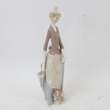 Lladro porcelain Edwardian girl with a dog, 36cm