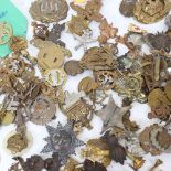 A quantity of various military badges, buttons and cap badges, including Royal Military Police,