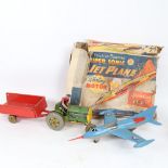 A Vintage Mettoy tinplate tractor and trailer, and a Marx jet plane (2)