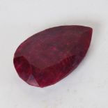 A 357ct unmounted pear mixed-cut ruby, dimensions: 57.00mm x 35.00mm x 17.00mm, evidence of colour