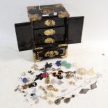 A table-top jewellery cabinet, with drawer fitted interior and engraved brass mounts, height 21cm