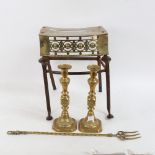 A 19th century engraved brass footman, a pair of brass candlesticks etc (4)