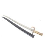A French 1868 pattern sword bayonet and scabbard, with brass hilt, blade length 57cm