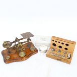 A set of oak balance scales and weights, silver napkin ring etc