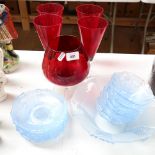 A Vintage blue glass dessert set, a set of 4 red glass vases, and a Brandy balloon