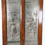 A large Victorian 2-section cast-iron fire screen, relief figural decoration with oak frame,