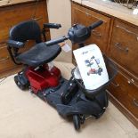 A DeVilbiss Healthcare Drive mobility scooter, with cables and battery