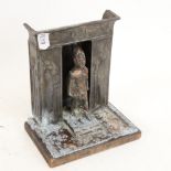 A Vintage Egyptian spelter shrine figure, with embossed designs, height 14cm