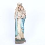 A mid-20th century painted plaster sculpture, depicting Madonna and Child, dated 1935, height 31cm