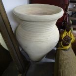 An unglazed terracotta garden pot, W45cm, H60cm