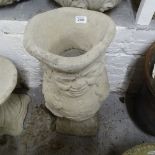 A concrete garden pot on stand in the form of a Toby jug, H61cm