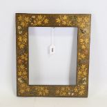 A decorative gilded and lacquered Kashmir frame, with hand painted leaf and insect decorated