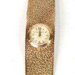 JAEGER LECOULTRE - a lady's Vintage 9ct gold mechanical wristwatch, silvered dial with half-hourly