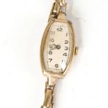 A lady's Vintage 9ct gold mechanical wristwatch, silvered dial with Arabic numerals and 9ct