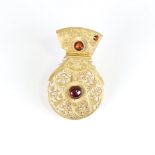 An Antique Verge pocket watch balance cock brooch, set with cabochon and faceted garnet, length 36.