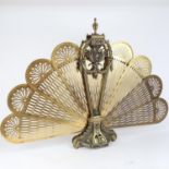 A Victorian brass peacock firescreen, height 67cm