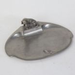 WMF - an Art Nouveau pewter dish, surmounted by Dachshund dog and lizard, W23cm