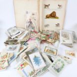 A Victorian scrap album, with various cut-outs, scraps, postcards, Christmas cards etc (2 boxes)