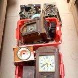 A large quantity of clock parts, dials, spares, and cases