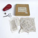 Victorian sewing scissors and thimble in leather case, and a group of embroidered panels by