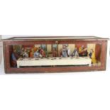 A large handmade Last Supper diorama scene, in glazed case, W96cm, H31cm, D36cm