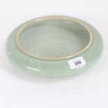 A Chinese celadon glaze shallow bowl, diameter 26cm