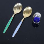 A sterling silver and blue enamel pepperette, by Volmer Bamner, and a pair of silver and enamel